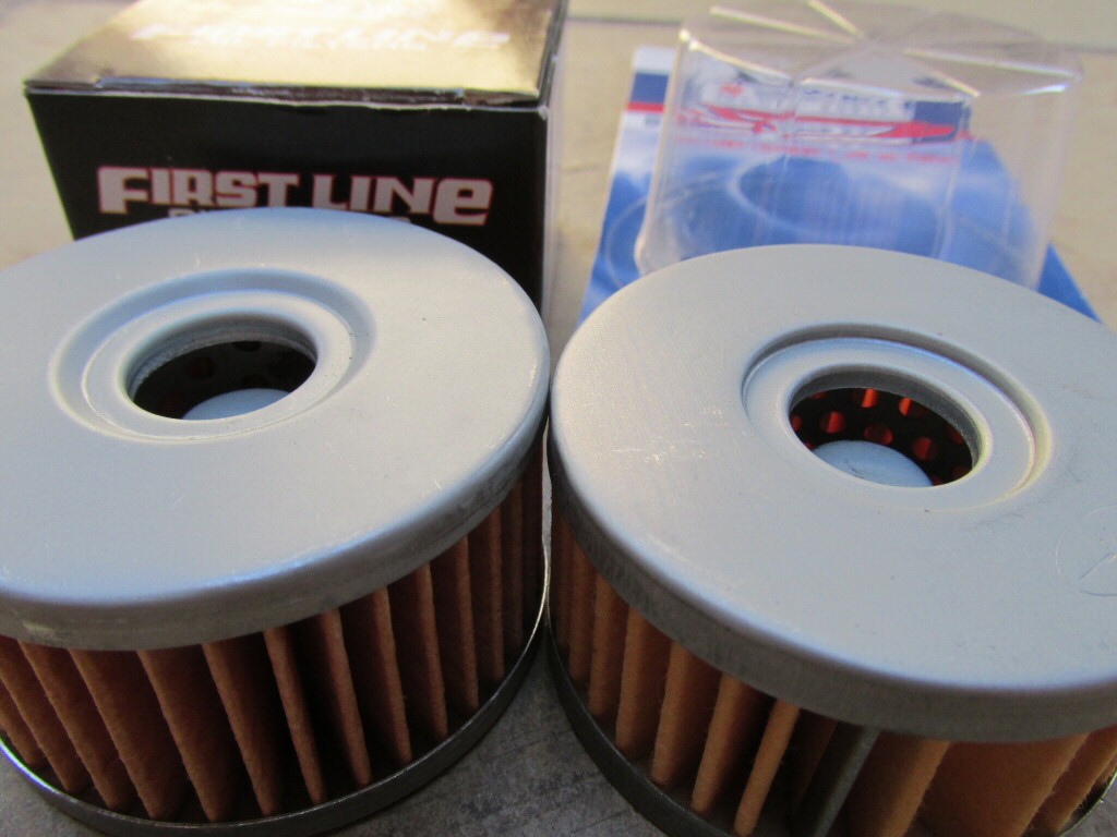 Tusk filter on left: depression measures ~1.6 mm in depth; Suzuki filter on right: depression measures ~1.9 mm in depth. In my experience, the shallower depth and more gradual corners of the Tusk depression may contribute to the small O-ring being displaced, thus compromising the seal.