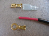 Either a ring terminal or a female spade terminal can be crimped in place for the connection to the battery positive terminal.