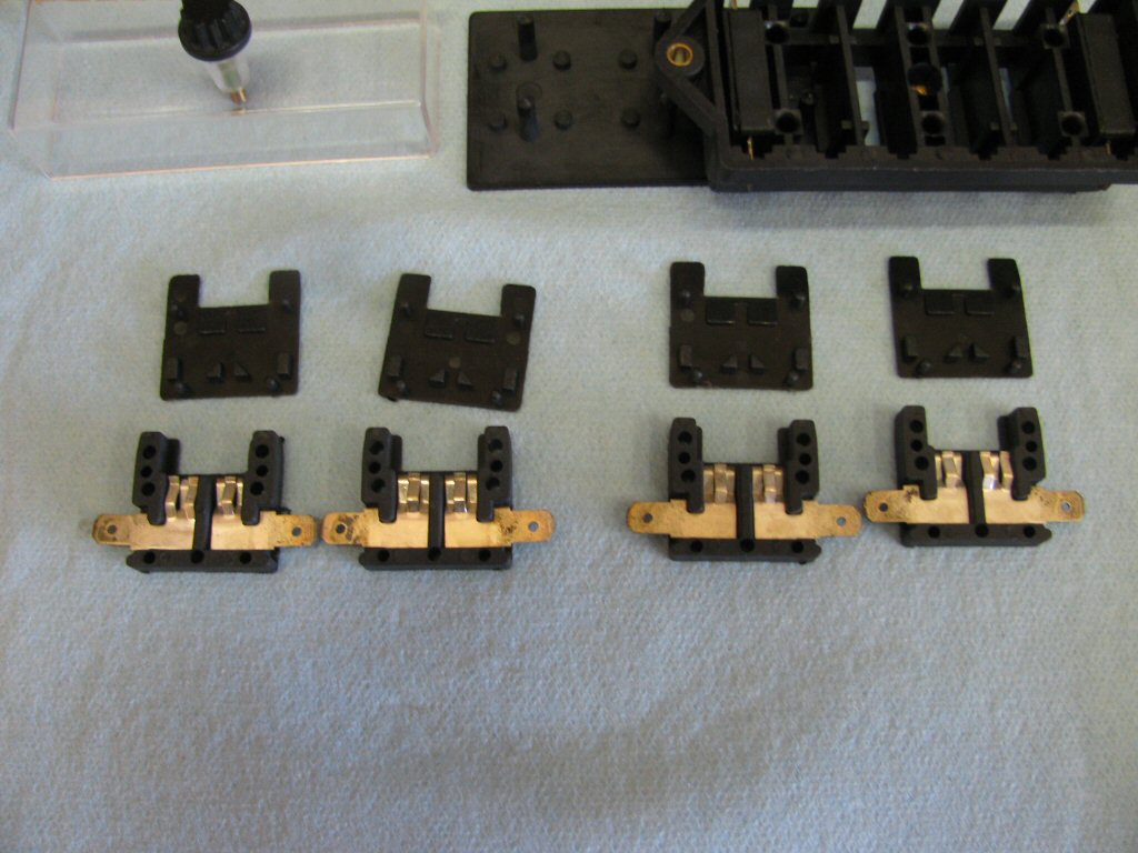 Here are four of the fuse holders disassembled.