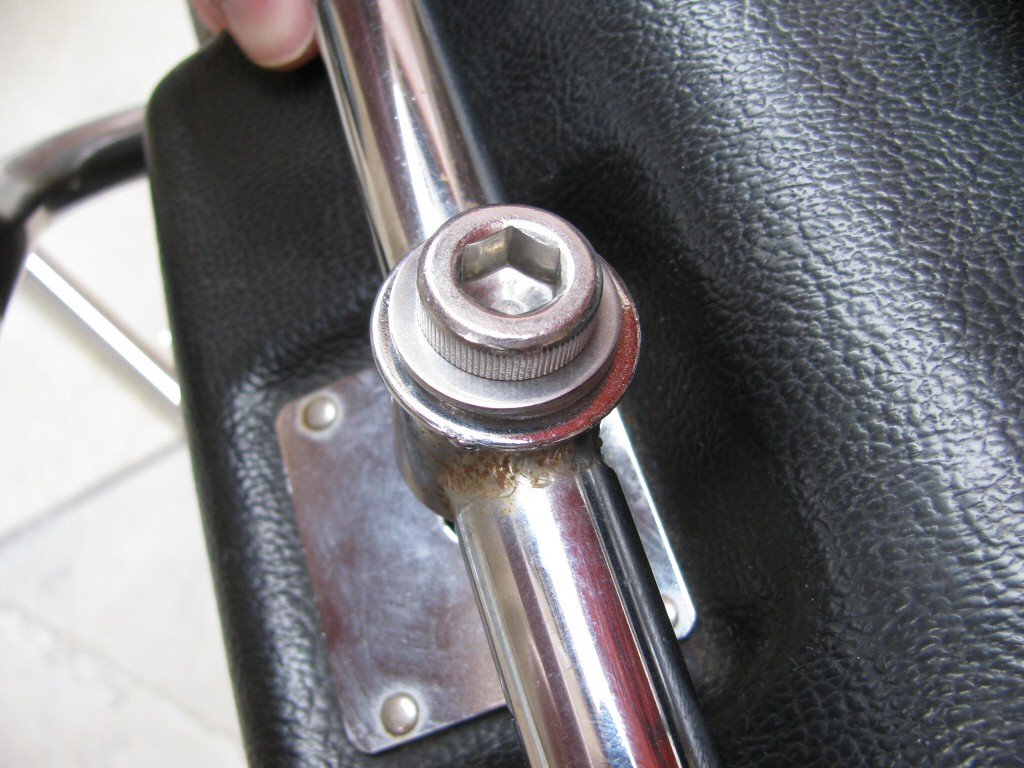 Bolts to secure Samsonite motorcycle saddlebags to the rack.