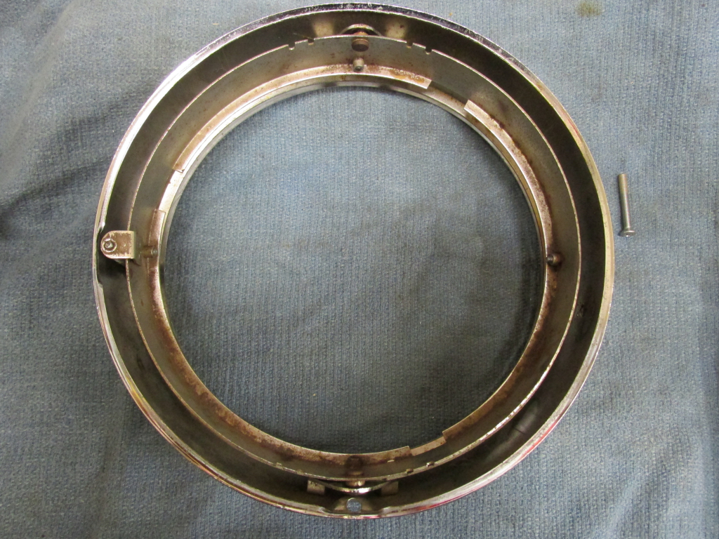 Inner and out rings. Moto Guzzi headlight as commonly fit to many 1970's Tonti models.