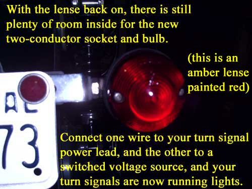 With the lens back on, there is still plenty of room inside for the new two-conductor socket and bulb. This is an amber lens painted red. Connect one wire to your turn signal power lead, and the other to a switched voltage source, and your turn signals are now running lights.
