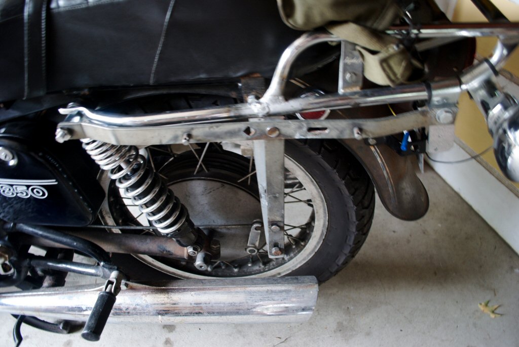 Wixom saddlebag brackets from a Suzuki adapted to a Moto Guzzi Eldorado.