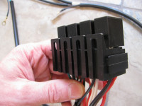 The relay brackets have mounting holes which you can use to mount to your plastic inner fender.