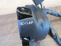 Domino left handlebar switch: flash high beam trigger.