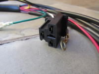Flat 3 terminal connection for the voltage regulator.