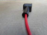 Rubber boot/cover shown in use with a 12 AWG wire and a 6 mm ring terminal. (MG# 12702900-ALT).