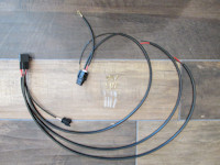 Plug-in-ready, relay-equipped harness for adding auxiliary lights for non-OEM LED lights on the Moto Guzzi V85 TT.