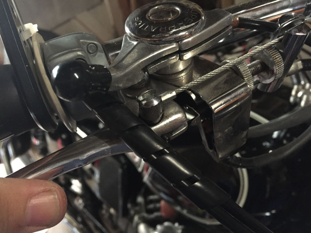 Adapting a micro switch to the four leading shoe front brake as used on some Moto Guzzi V700, V7 Special, Ambassador, 850 GT, 850 GT California, Eldorado, and 850 California Police motorcycles.