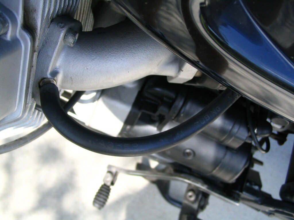 Vacuum hose connection on left side intake manifold. Installing a cruise control on a Moto Guzzi Quota 1100 ES.