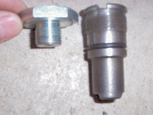Disc brake fork top nut and tube sleeve for Moto Guzzi 850 GT, 850 GT California, Eldorado, and 850 California Police motorcycles fitted with a disc front brake.