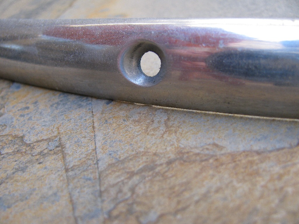 Aluminum trim piece (MG# 12578240).