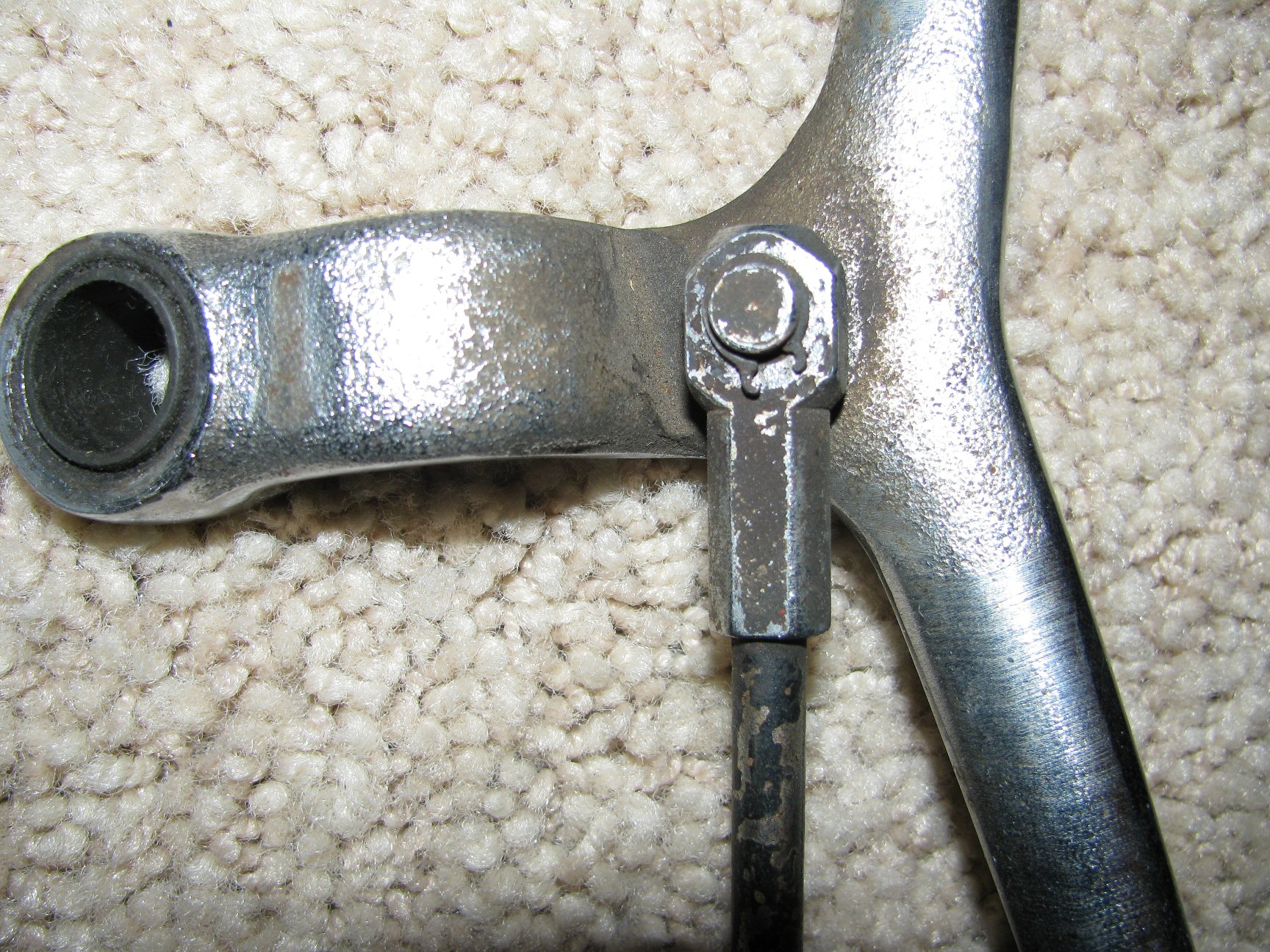 Inside close up of the Tonti frame shift lever.