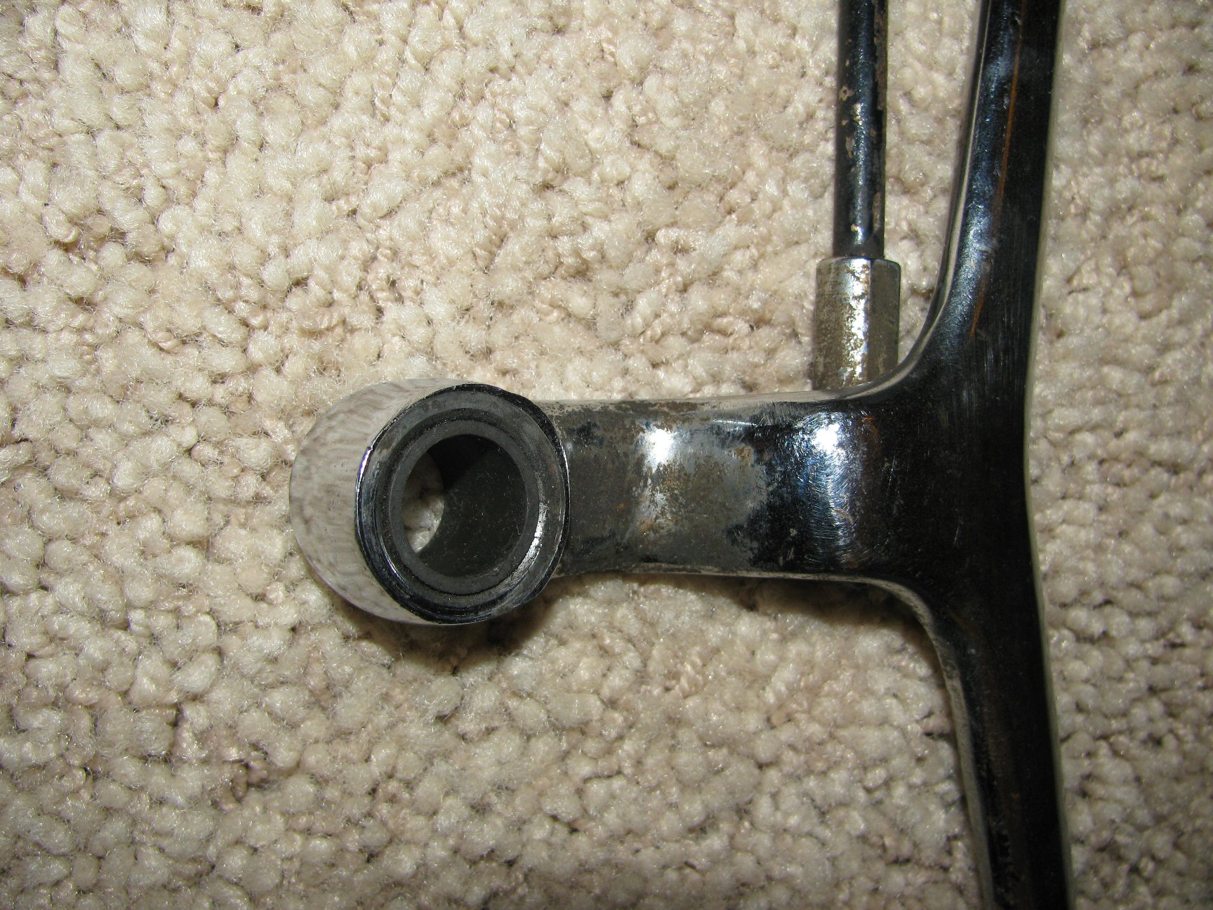 Outside close up of the Tonti frame shift lever.
