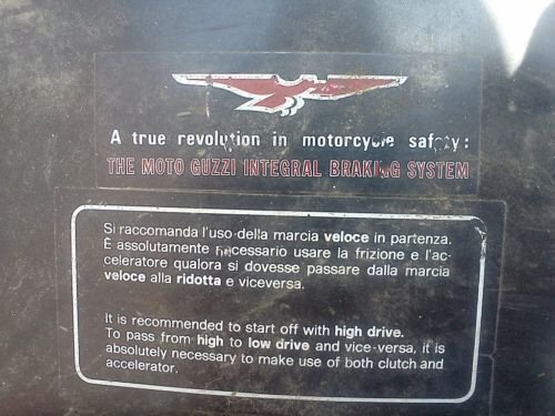 Decal as affixed to the top of a Moto Guzzi I-Convert fuel tank. Thanks to Gordon Kline of MG Cycle for sending me the link to this photo.