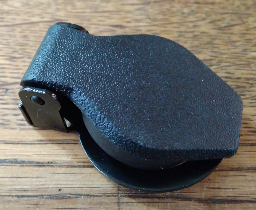 Replacement ignition switch cover with rubber seal.