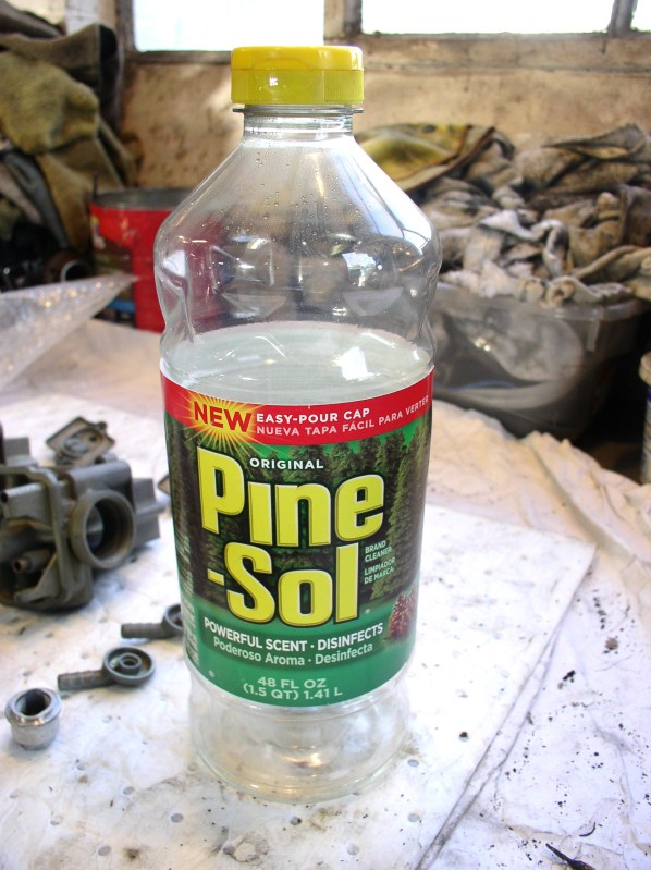 One of the two bottles of Pine-Sol used to clean Moto Guzzi carburetors.