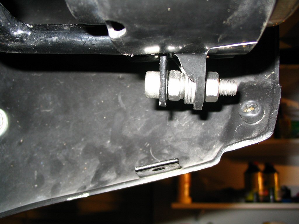Bottom left headlight mount. Mounting a Yamaha FZR headlight to a Moto Guzzi Quota 1100 ES.