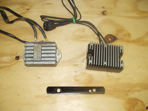Simple mounting bracket for mounting an aftermarket voltage regulator on a Moto Guzzi Quota 1100 ES.