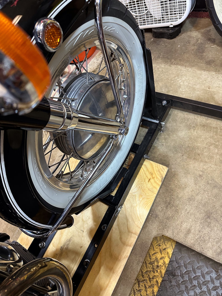 Modifying a motorcycle wheel chock to work with a Moto Guzzi motorcycle.