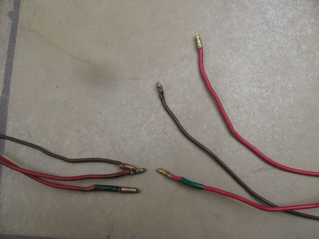 Sub-harness connecting the ignition switch to the fuse block and distribution panel. It also connects the 3 connection female spade connectors to the rear turn signals. Note the green markers Moto Guzzi used to distinguish one red wire from the other.