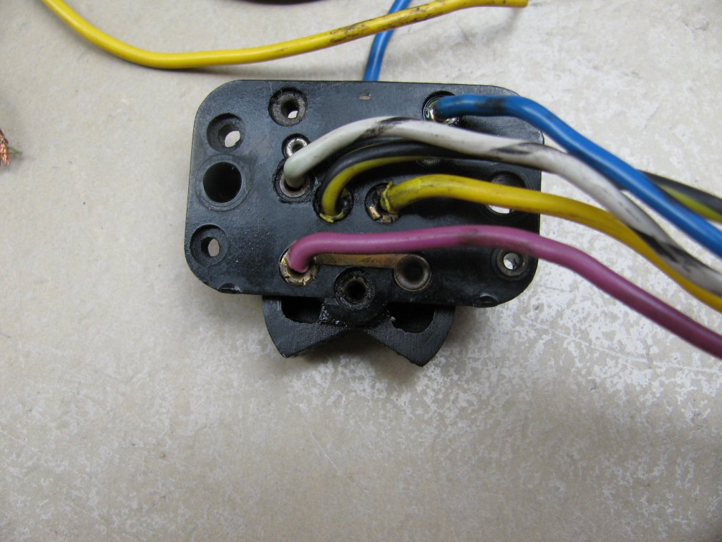 Close up view of wire connections on the bottom of the right handlebar switch.